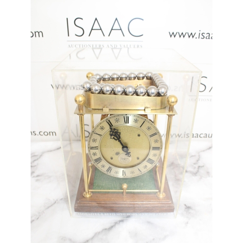 145 - Twaites & Reed Rolling Ball Clock c1950's - Measures 31cm High x 22cm Width

This lot is collection ... 