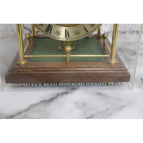 145 - Twaites & Reed Rolling Ball Clock c1950's - Measures 31cm High x 22cm Width

This lot is collection ... 