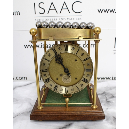 145 - Twaites & Reed Rolling Ball Clock c1950's - Measures 31cm High x 22cm Width

This lot is collection ... 