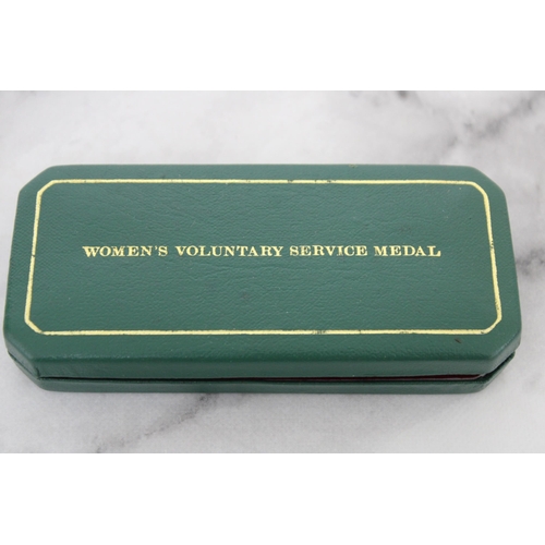 276 - Boxed Women's Voluntary Service Medal & Royal Air Force Badge