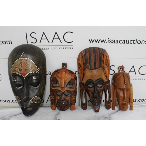 19 - Four Wooden Masks
All Proceeds Go To Charity