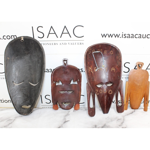 19 - Four Wooden Masks
All Proceeds Go To Charity