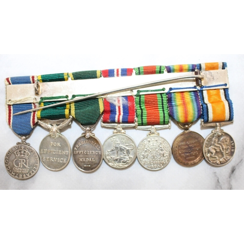 308 - WWI & WWII Military Medal Group of Seven - Includes Miniatures

WWI Named to 31819 PTE J OXENHAM. TH... 