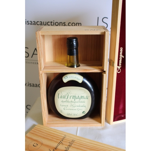 223 - Two Wooden Cased Armagnac Bottles
Collection Only