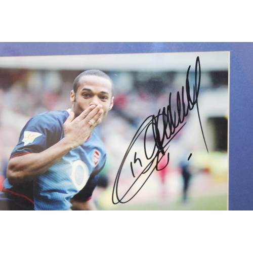 232 - Signed Framed Photograph of Thierry Henry with COA by Joseph Michael Collectables

Frame measures 40... 