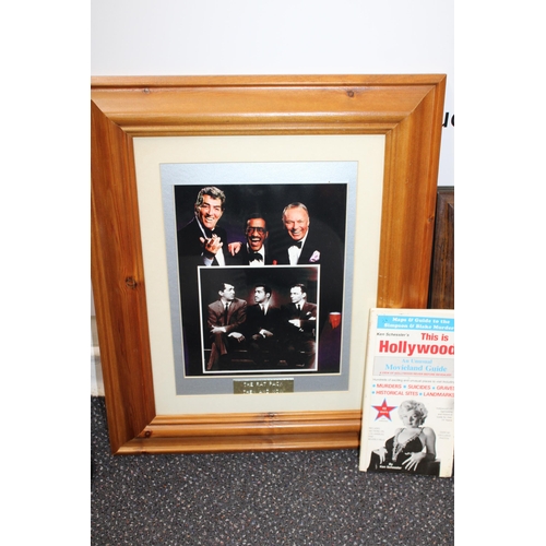 96 - Rat Pack Frames and Sinatra Figurine
Rat Pack Frame Measures-
Height 47.5cm
Width 39.5cm
Crack in De... 