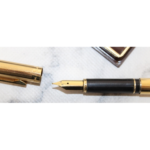 545 - Two Boxed Pens 
One Fountain Pen & Pencil
One GOLD ELECTROPLATED SHEAFFER U.S.A Fountain Pen
All pro... 