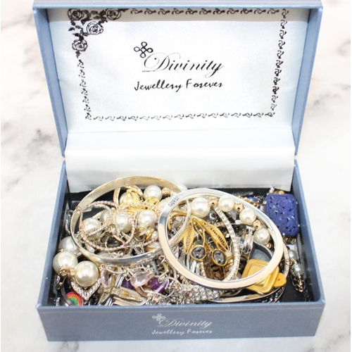 410 - Jewellery Items In Box
All proceeds Go To Charity