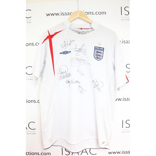 257 - England Signed Football Shirt
Signatures include

Paul Merson
Kenny Sansom

8 Signatures in total.