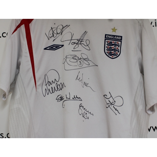 257 - England Signed Football Shirt
Signatures include

Paul Merson
Kenny Sansom

8 Signatures in total.