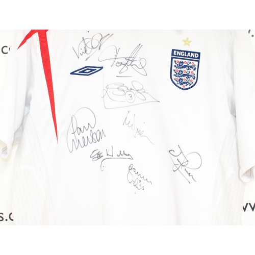 257 - England Signed Football Shirt
Signatures include

Paul Merson
Kenny Sansom

8 Signatures in total.