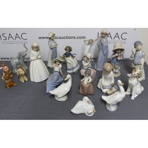 142 - Quantity Of Collectable Figurines Including Nao/Royal Doulton/And Others
Tallest 27.5cm
COLLECTION O... 