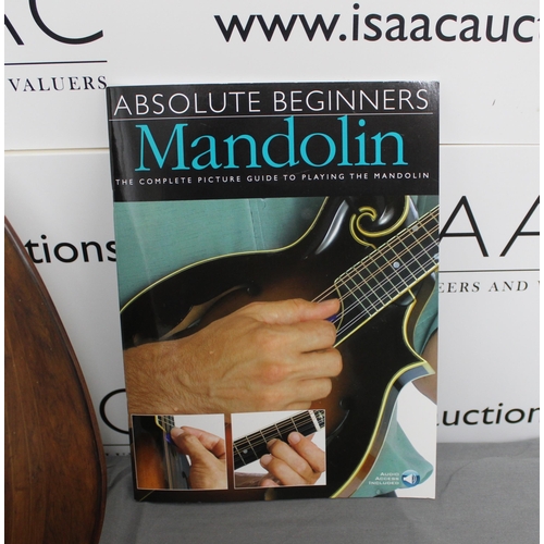 168 - Carlo Overi & Figlio, Napoli  Mandolin. Comes with a Learning Guide Booklet

Collection Only