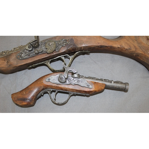 102 - Pair of Wooden Decorative Guns