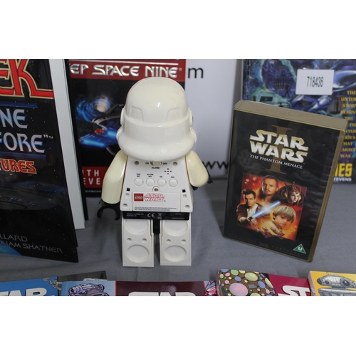 602 - Star Wars Collectable Items Inc-
VHS Video's
Books
Lego Star Wars Alarm Clock (Untested)