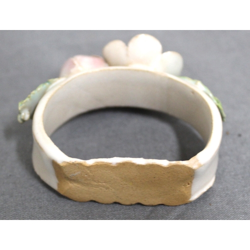 31 - Six Clay/Ceramic Napkin Rings