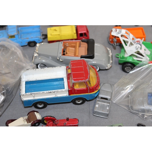 679 - A Quantity Of Collectable Vehicles And Accessories Inc-
Corgi,
Dinky Toy
Britains Ltd
Top Boy
Matchb... 