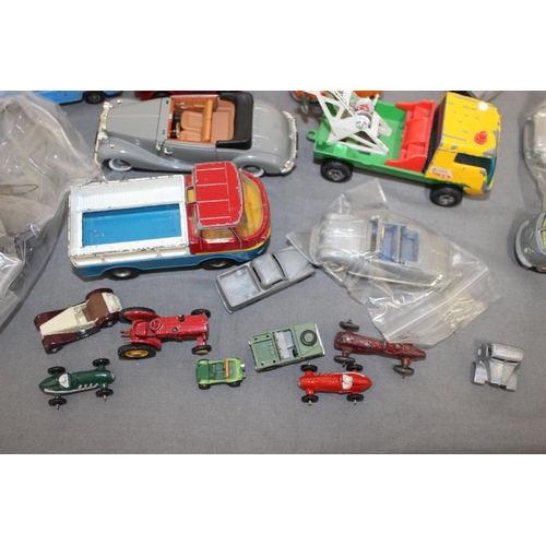 679 - A Quantity Of Collectable Vehicles And Accessories Inc-
Corgi,
Dinky Toy
Britains Ltd
Top Boy
Matchb... 