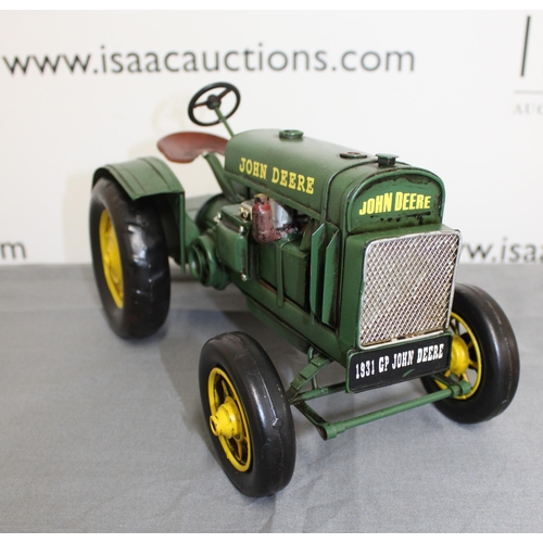 682 - Boxed Tin Plate 1931 John Deere Tractor
Length 31cm