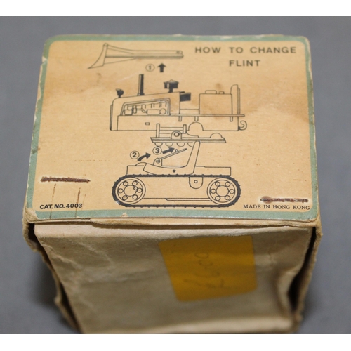 706 - Boxed Vintage Lincoln International Mini Windup Sparking Bulldozer