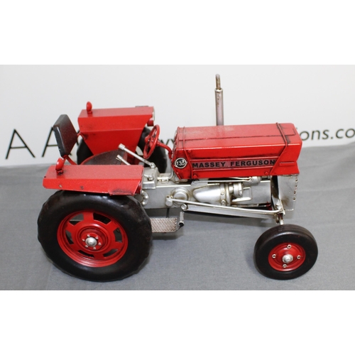 716 - Tin Plated Massey Ferguson Tractor Boxed 
26cm