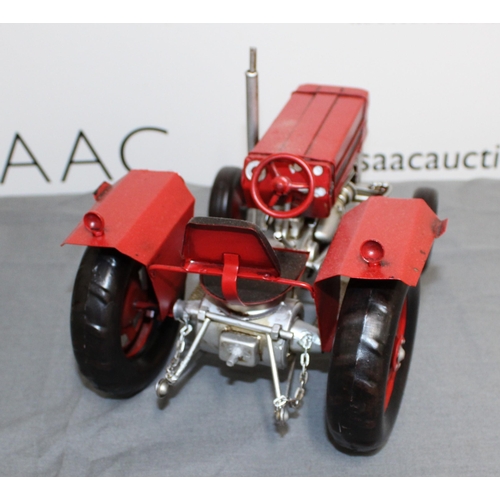 716 - Tin Plated Massey Ferguson Tractor Boxed 
26cm