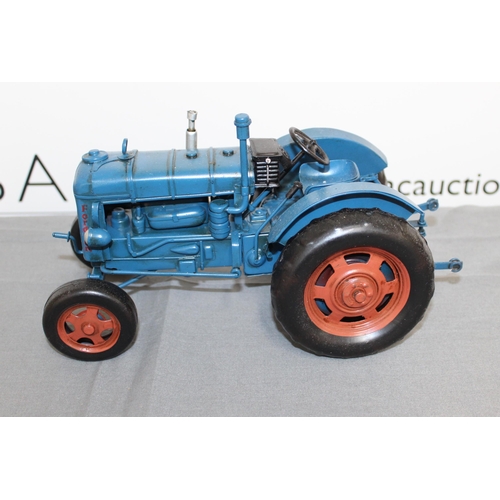 733 - Tin Plated Fordson Tractor Boxed
Length 27cm