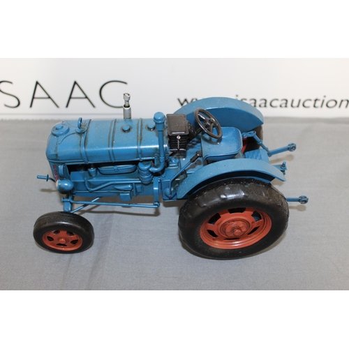 733 - Tin Plated Fordson Tractor Boxed
Length 27cm