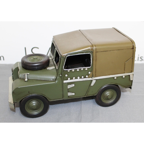 734 - Tin Plated Lesser And Pavey  Green Landrover Boxed
Length 27cm