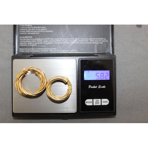 518 - Two Pairs Stamped 375 Gold Hooped Earrings
Total Weight-5.82g