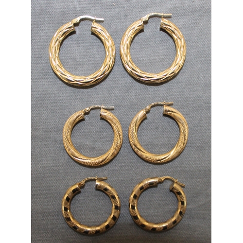 520 - Three Pairs Stamped 375 Gold Hooped Earrings
Total Weight-7.27g