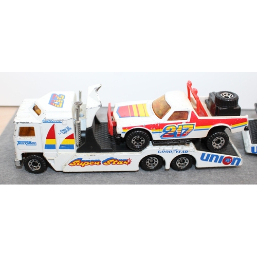 750 - Two Matchbox Kenworth/Stock Car Sets