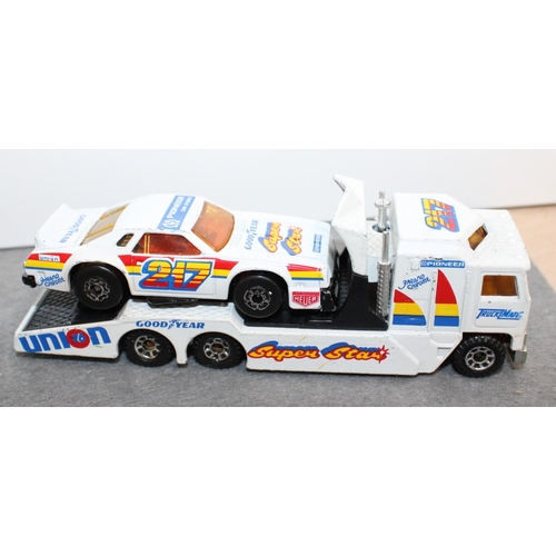 750 - Two Matchbox Kenworth/Stock Car Sets