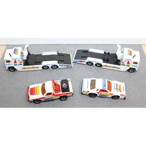 750 - Two Matchbox Kenworth/Stock Car Sets