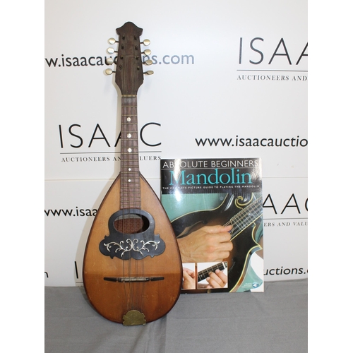 116 - Carlo Overi & Figlio, Napoli  Mandolin. Comes with a Learning Guide Booklet

Collection Only