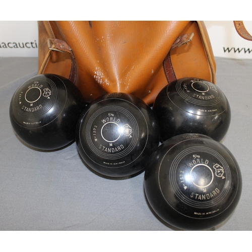 457 - A Set Of Bowling Balls In A Leather Bag