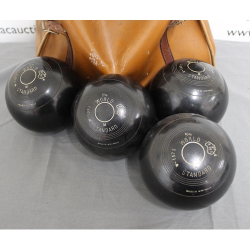 457 - A Set Of Bowling Balls In A Leather Bag