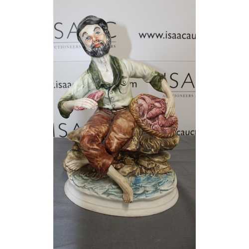 54 - A Capodimonte Style figure of a Fisherman
Damage Shown In Picture
Height 33cm
Collection Only