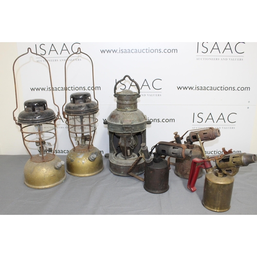 108 - A Mixed Collection Of Industrial Lamps And Blowtorches