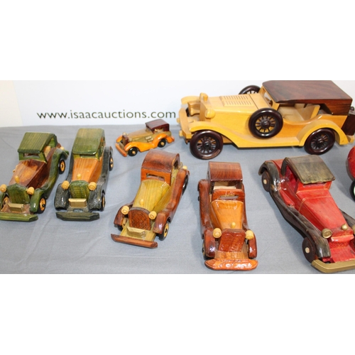 561 - A Collection Of Wooden Vintage Style Cars One Stamped Woodentops London,
Longest One 38cm