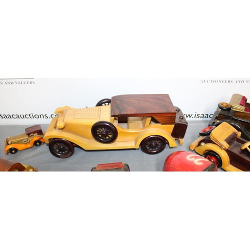 561 - A Collection Of Wooden Vintage Style Cars One Stamped Woodentops London,
Longest One 38cm