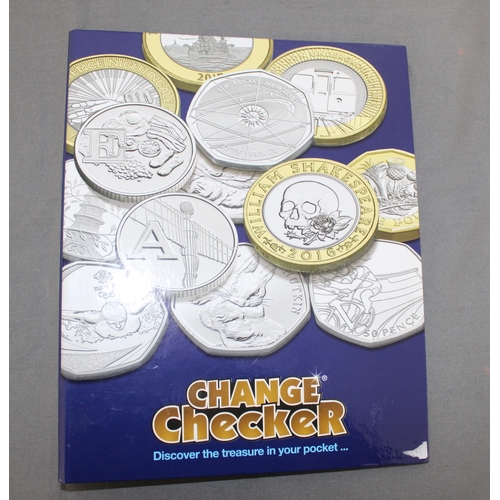 202 - Change Checker Album Containing £5 And Two 50p Pieces