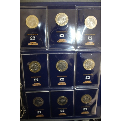 204 - Change Checker Album Containing 18 x £2 Coins