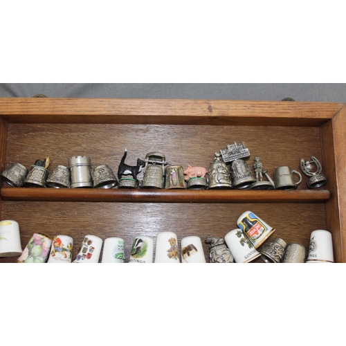 74 - Collection Of Thimbles & Others In Glass Wooden Case
Case Height-42cm
Width-30.5
COLLECTION ONLY