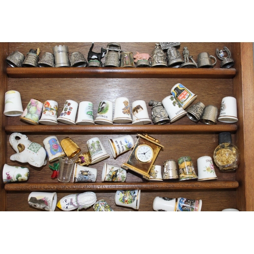 74 - Collection Of Thimbles & Others In Glass Wooden Case
Case Height-42cm
Width-30.5
COLLECTION ONLY