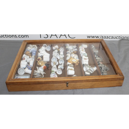 74 - Collection Of Thimbles & Others In Glass Wooden Case
Case Height-42cm
Width-30.5
COLLECTION ONLY