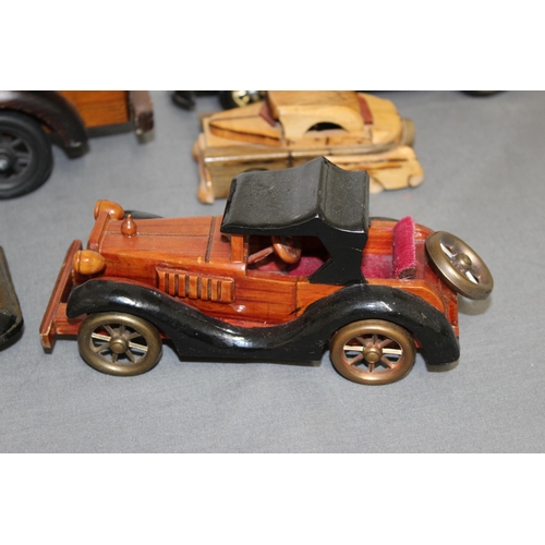 572 - Collection Of Wooden Vehicles Inc A Wooden Bike Puzzle 
Longest-37cm