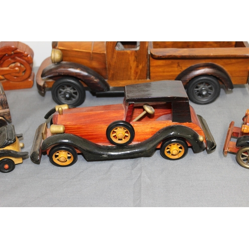 572 - Collection Of Wooden Vehicles Inc A Wooden Bike Puzzle 
Longest-37cm