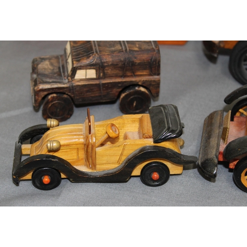 572 - Collection Of Wooden Vehicles Inc A Wooden Bike Puzzle 
Longest-37cm