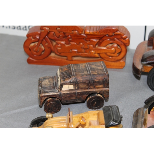 572 - Collection Of Wooden Vehicles Inc A Wooden Bike Puzzle 
Longest-37cm